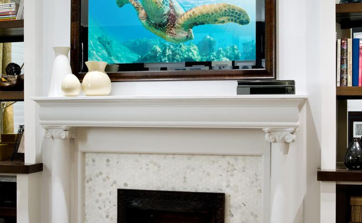 Seura Vanishing Entertainment TV/Mirror in Living Room above Fireplace TV On